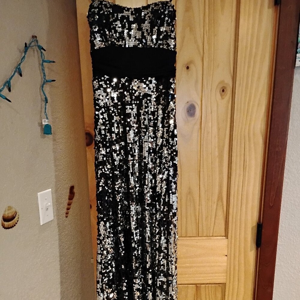 A black and silver sequin dress